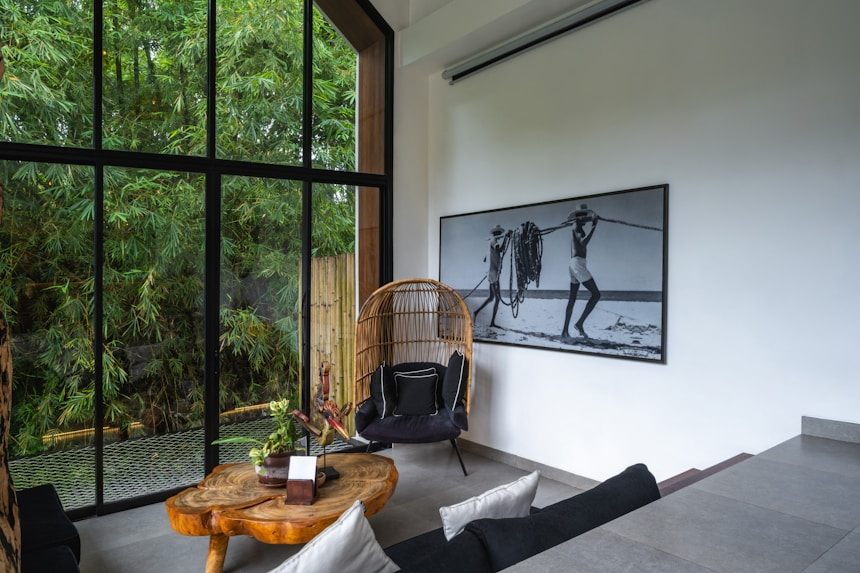 Lounge with full-height black framed glazing