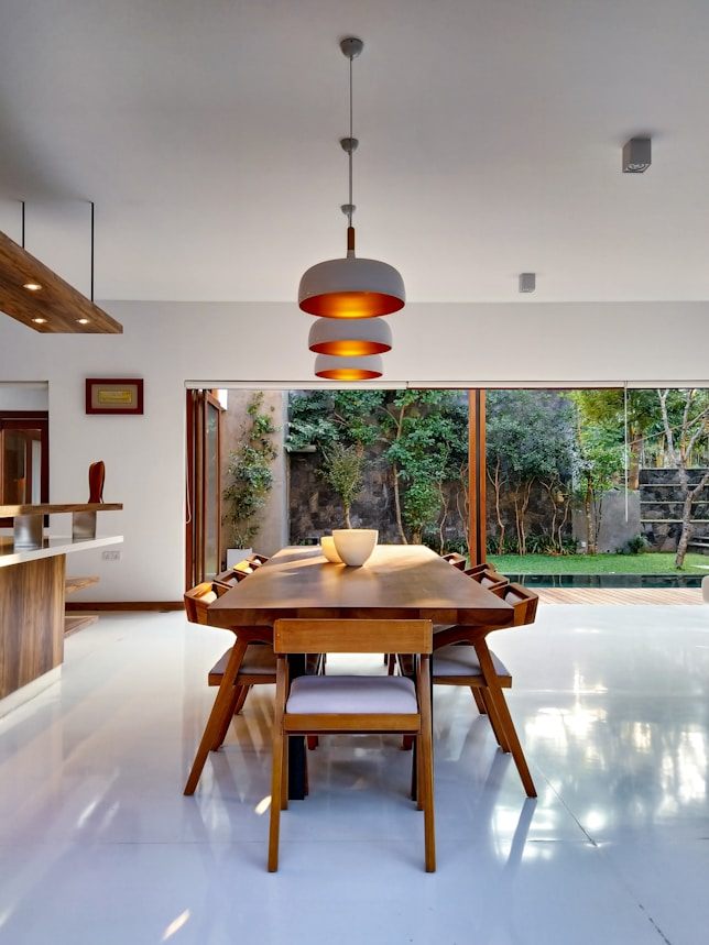 Dining area opening onto a garden