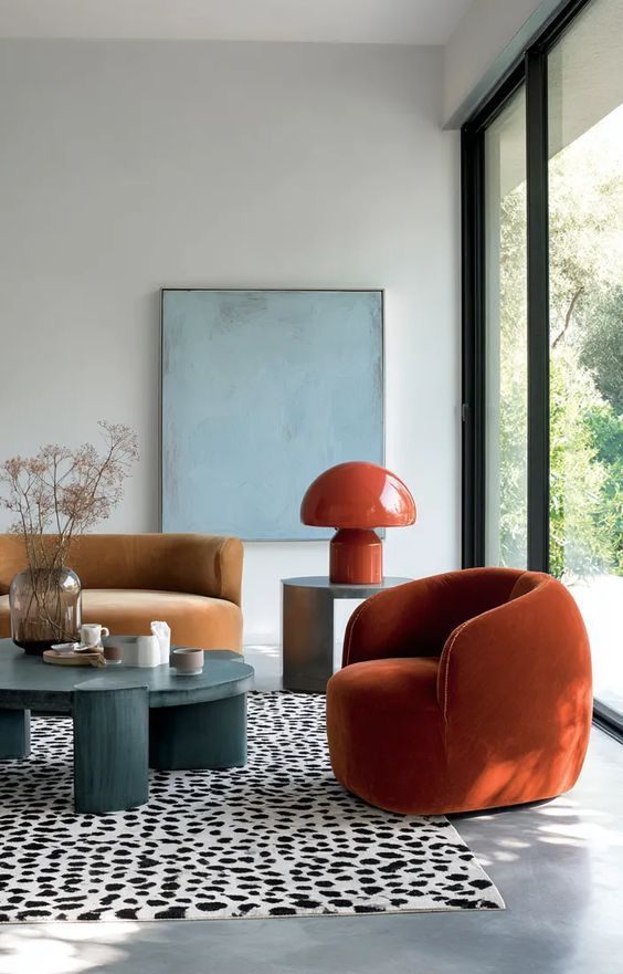 Commercial lounge with orange armchairs